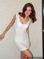 Teen brunette with shaved pussy poses