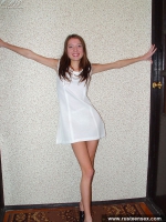 Teen brunette shows her shaved pussy