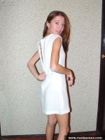 Teen brunette shows her shaved pussy
