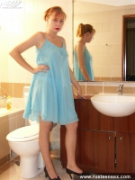 Teen blonde posing naked in the bathroom
