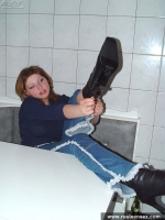 Russian teen undressing and posing in the kitchen