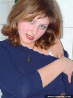 Russian teen undressing and posing in the kitchen