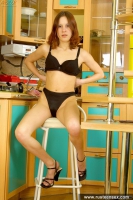 Russian teen redhead fingering on a barstool