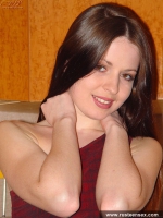 Russian teen brunette with small tits shows shaved pussy