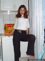 Russian teen brunette takes off clothes and posing naked