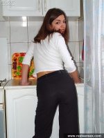 Russian teen brunette takes off clothes and posing naked