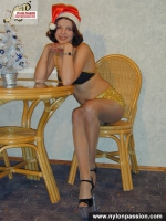 Pantyhose brunette in Christmas hood