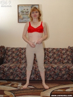 Cute MILF shows shaved pussy
