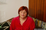 Mature horny fatty undresses and stretches pussy lips