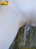 Teen blonde pisses on a winter tree