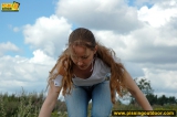 Teeb blonde pisses outdoor on rocks