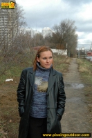 Outdoor pissing in leather jacket