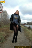 Outdoor pissing in leather jacket