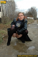 Outdoor pissing in leather jacket