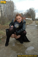 Outdoor pissing in leather jacket