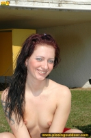 Teen brunette pissing in the park