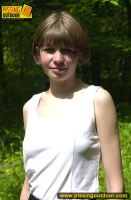 Pissing outdoor in the forest of naked teen girl