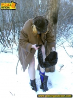 Winter outdoor pissing of girl naked under coat