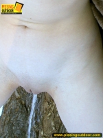 Winter outdoor pissing of girl naked under coat