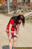 Outdoor pissing of teen brunette shocking villagers