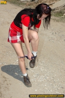 Outdoor pissing of teen brunette shocking villagers