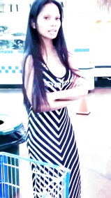 Sexy filipino babe in long striped skirt shopping for meat