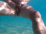 She loves to get naked at the beach....