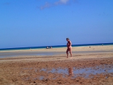 She loves to get naked at the beach....
