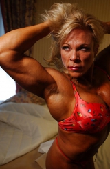 Very muscular mature blonde posing