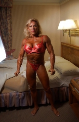 Very muscular mature blonde posing