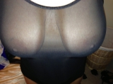 My girlfriend wearing black stockings suspenders and heels