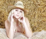Blond teen strips in the straw