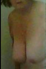 Showing off her big tits