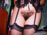 Woman with hairy pussy in stokings 1