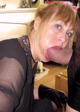 SKIN TIGHT SHINY PVC SKIRT CUM SLUT DRESSED SUCKING OFF COCK