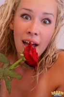 Naked Debbie with rose