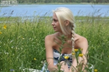 Nude blonde outside