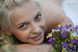 Nude blonde outside