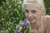 Nude blonde outside