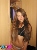 Long haired girlfriend striptease