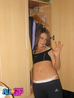 Long haired girlfriend striptease