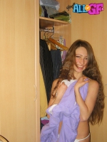 Long haired girlfriend striptease