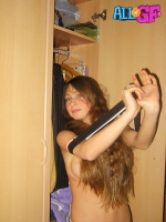 Long haired girlfriend striptease