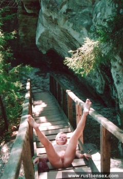 Teen blonde shows her shaved pussy outdoor - N