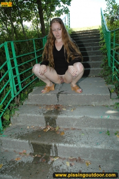 Pissing on outdoor concrete ladder - N