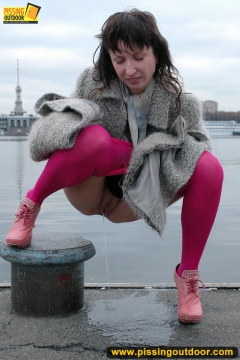 Outdoor pissing on embankment by MILF brunette - N