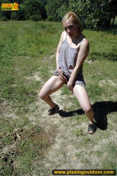 Outdoor pissing on the road wetting it with pee - N