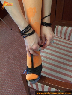 Orange pantyhose fetish teen girl posing on the floor - N