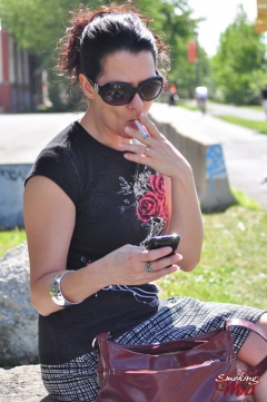 Redhead Mina in her sunglasses sexy smoking on a sunny day - N