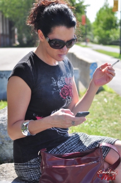Brunette babe smoking at the park - N